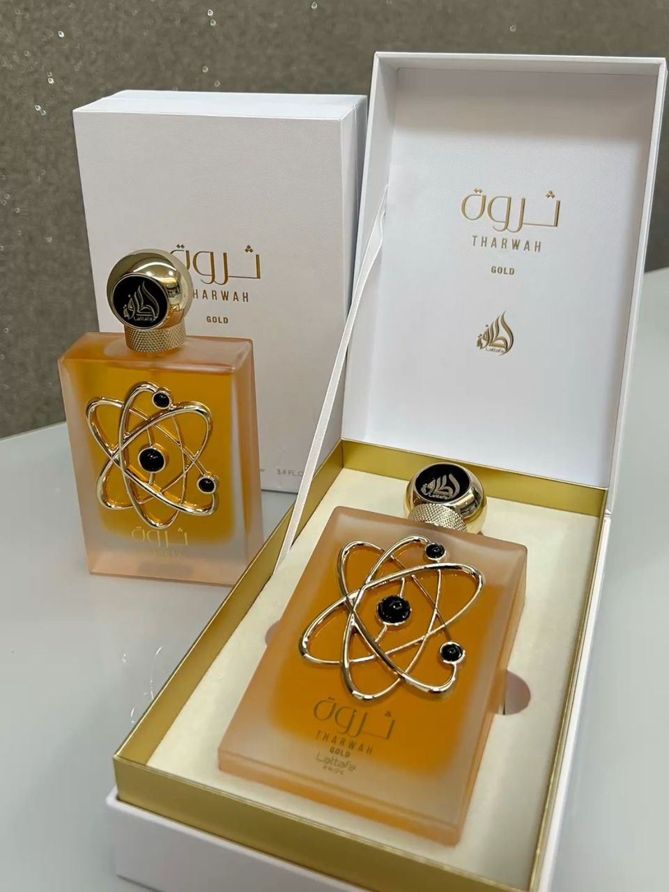 عطر لطافه مدل ثروت گلد (طلایی) حجم 100میل