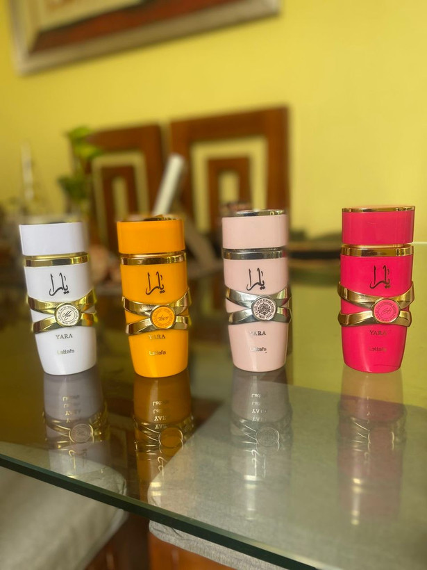 عطر لطافه مدل یارا نارنجی (توس)حجم 100میل